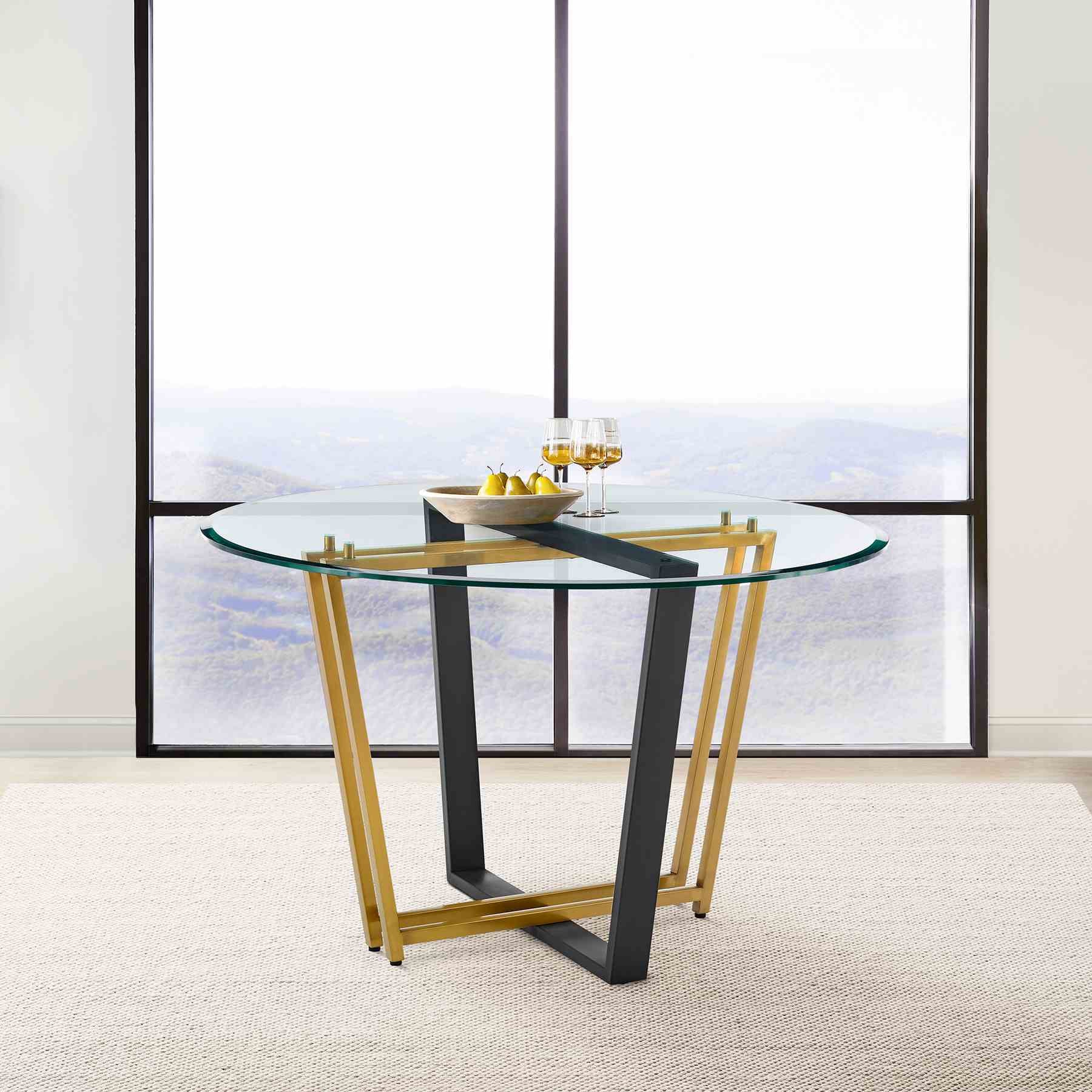 Devi 48" Round Dining Table in Gold Stainless Steel and Black Iron Base with Glass Tabletop - Image 8
