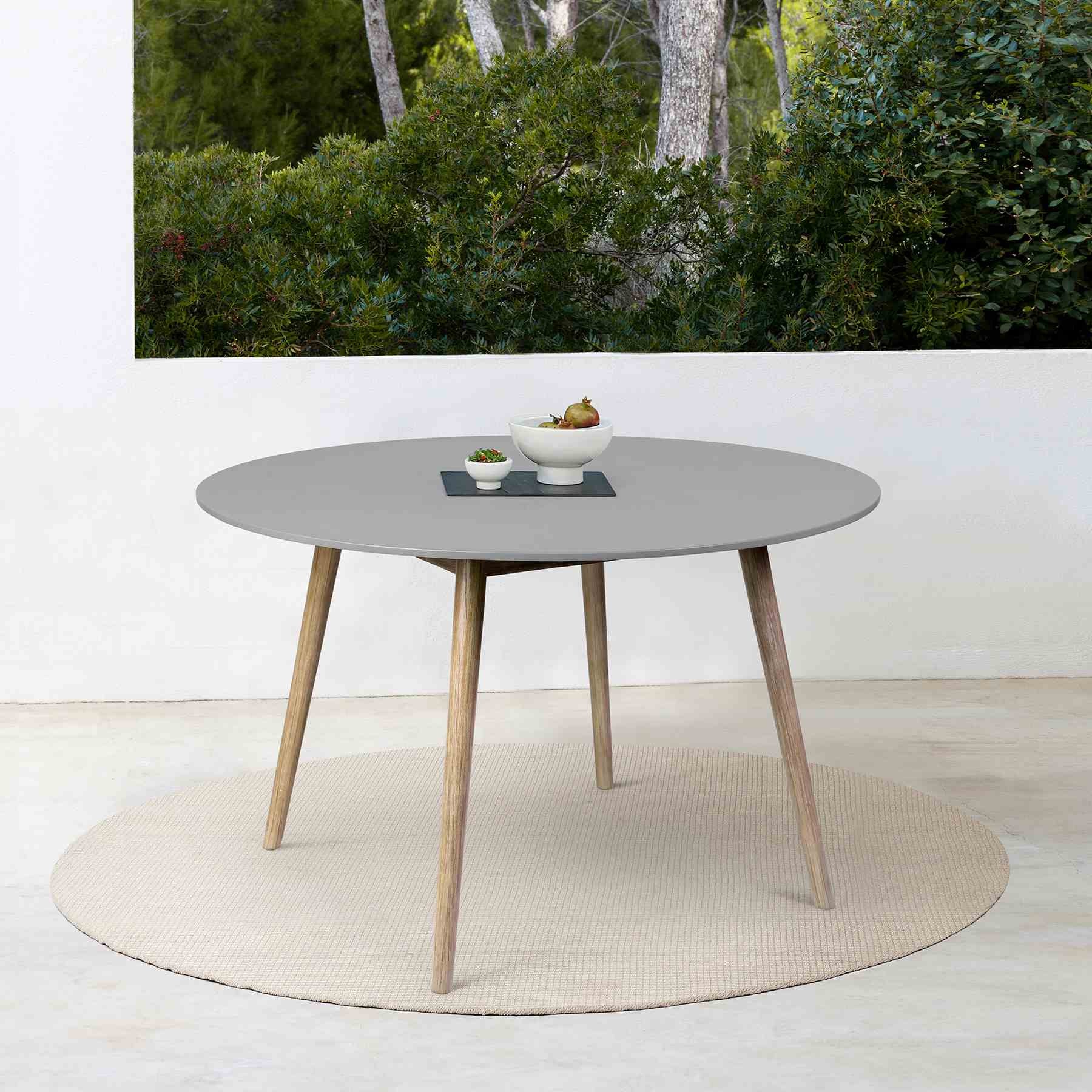 Kylie Outdoor Patio Round Dining Table in Light Eucalyptus and Gray Stone - Image 9